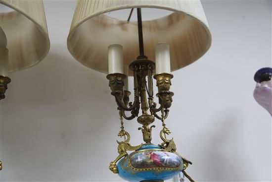 A pair of Sevres style porcelain and ormolu mounted table lamps, late 19th century, total height 60cm